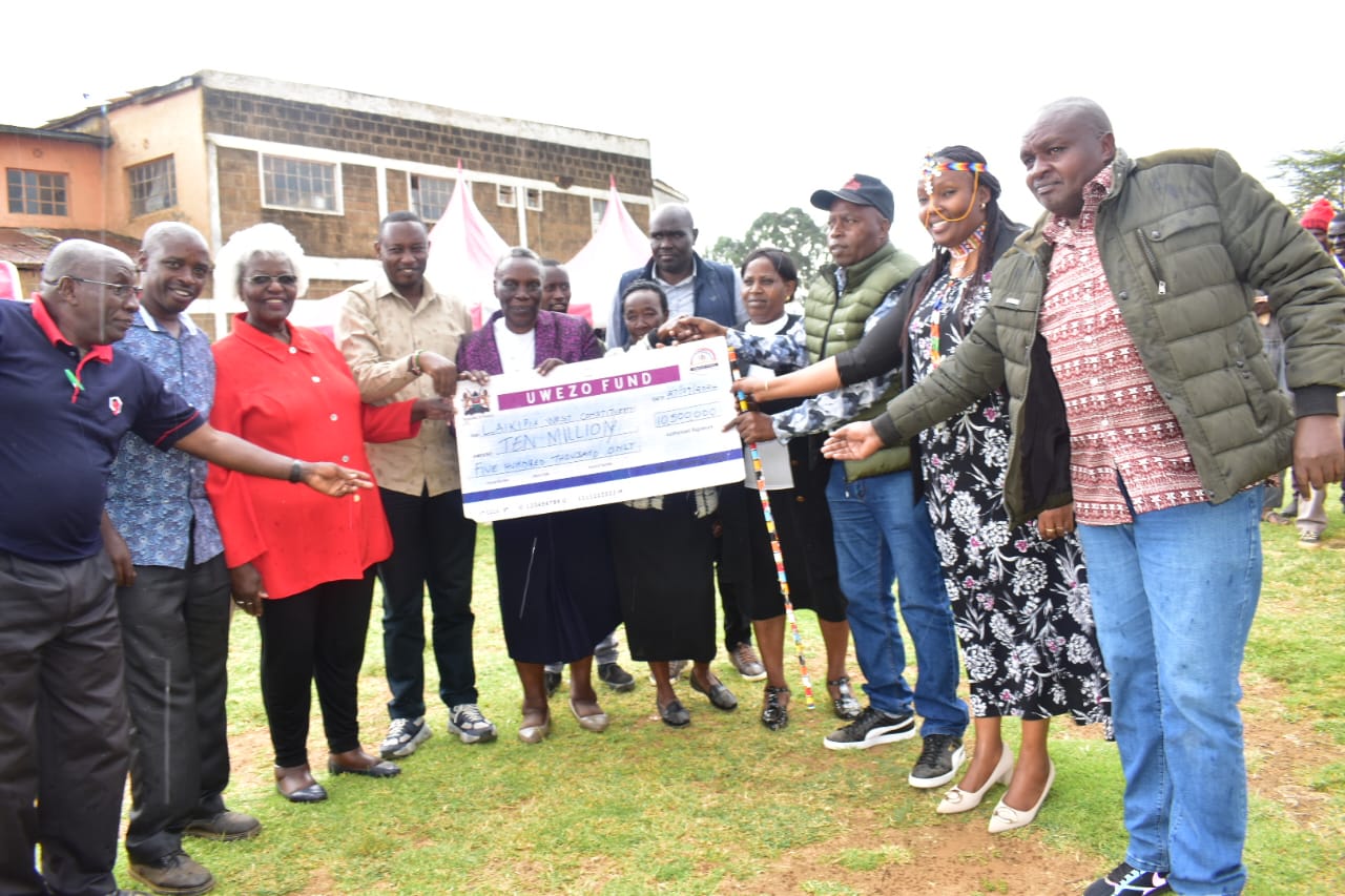 Board Director, Ms Wanjiku Muhato and Uwezo Fund CEO during the Laikipia cheque issuance