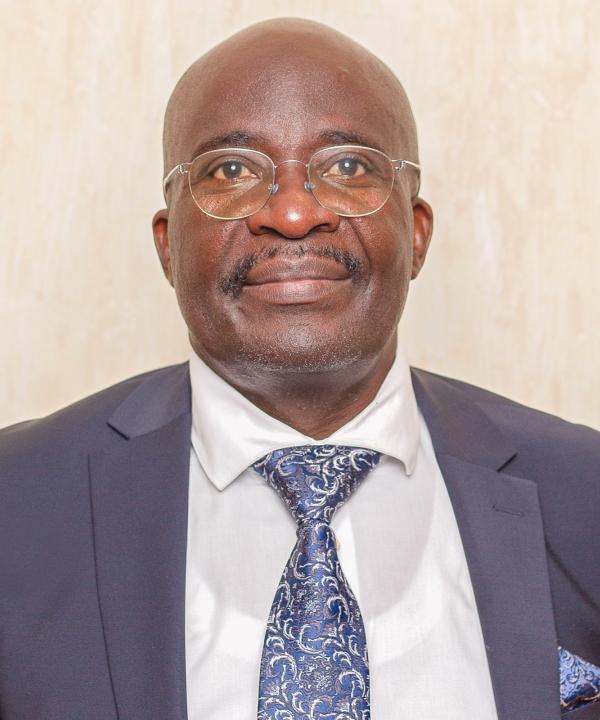 Mr. Sam Ogola - Member