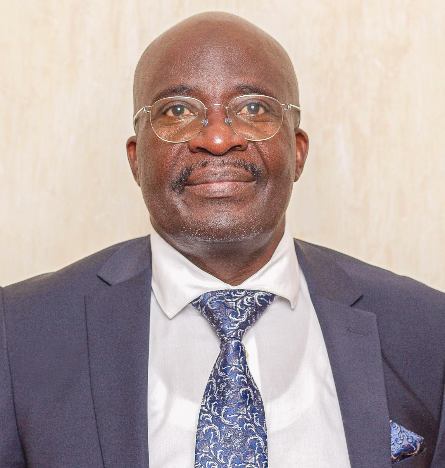 Mr. Sam Ogola - Member